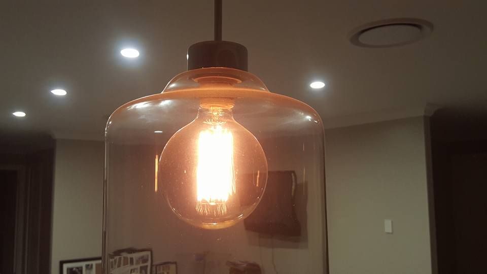 Light Bulb Is Hanging From The Ceiling — Stand Fast Electrical Pty Ltd in Stanthorpe, QLD