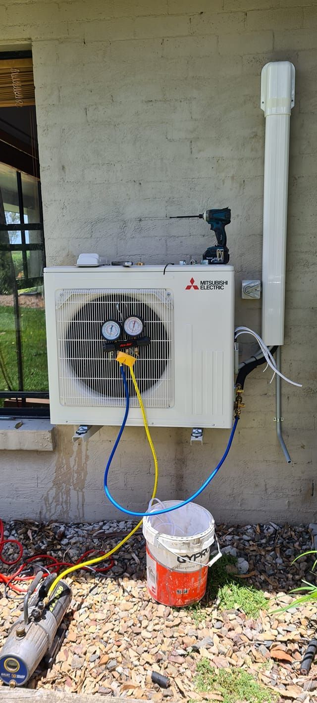 Air Conditioner Installed On The Side Of The House — Stand Fast Electrical Pty Ltd in Warwick, QLD