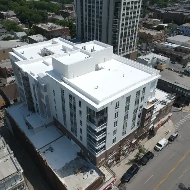 Evanston IL roofers and professional roofing experts Evanston Illinois specializing in commercial flat roof replacement, residential asphalt shingle systems, hail-damaged roofing services, and thermoplastic membrane sealing for retail buildings, schools, and multi-family properties.