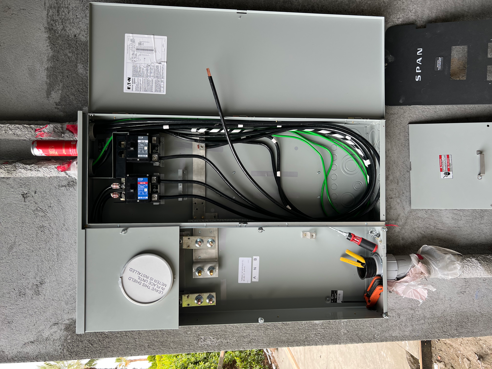 A box with a lot of wires inside of it