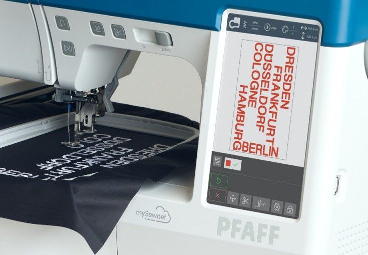 A close up of a pfaff sewing machine