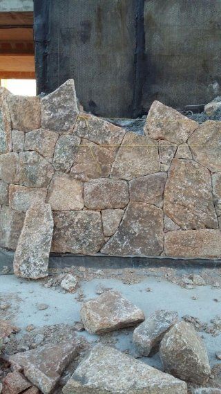 Realizzazione muro in pietra