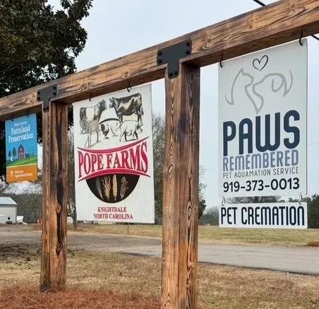 A sign for paws remembered pet cremation service