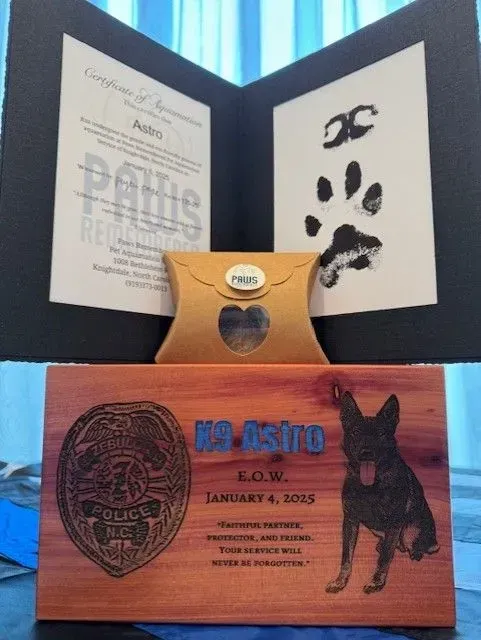 A wooden box with the name k9 astro on it