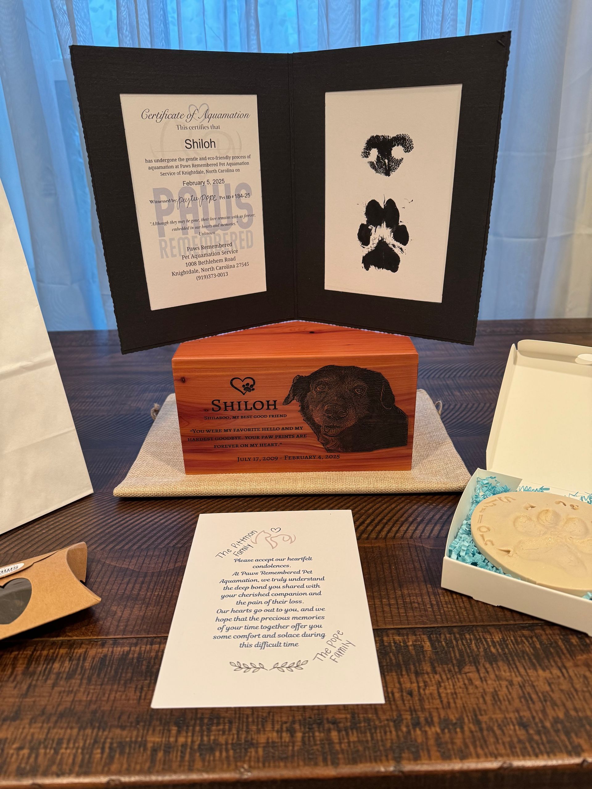 A wooden box with a picture of a dog on it