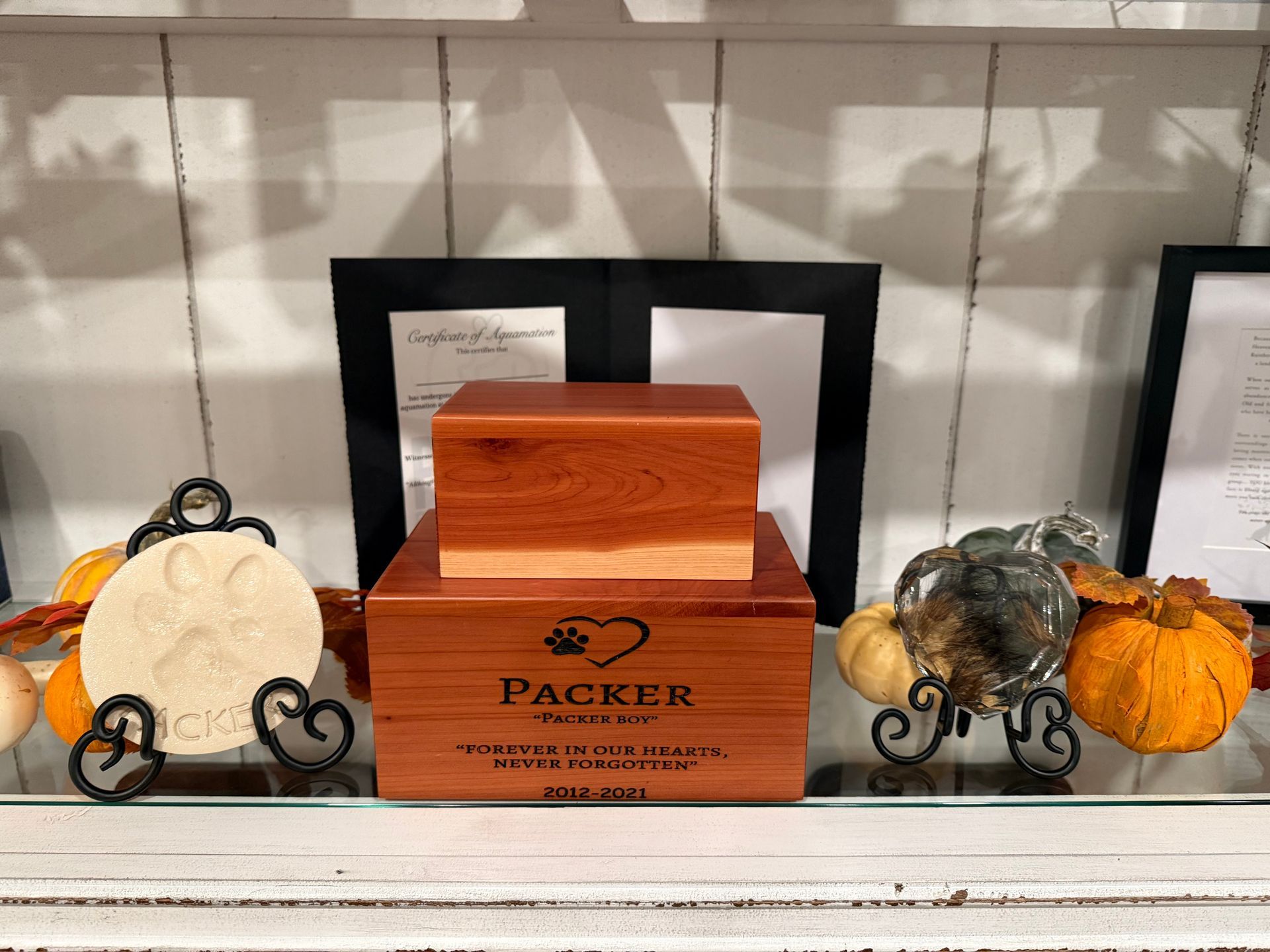 A wooden box with the word packer on it