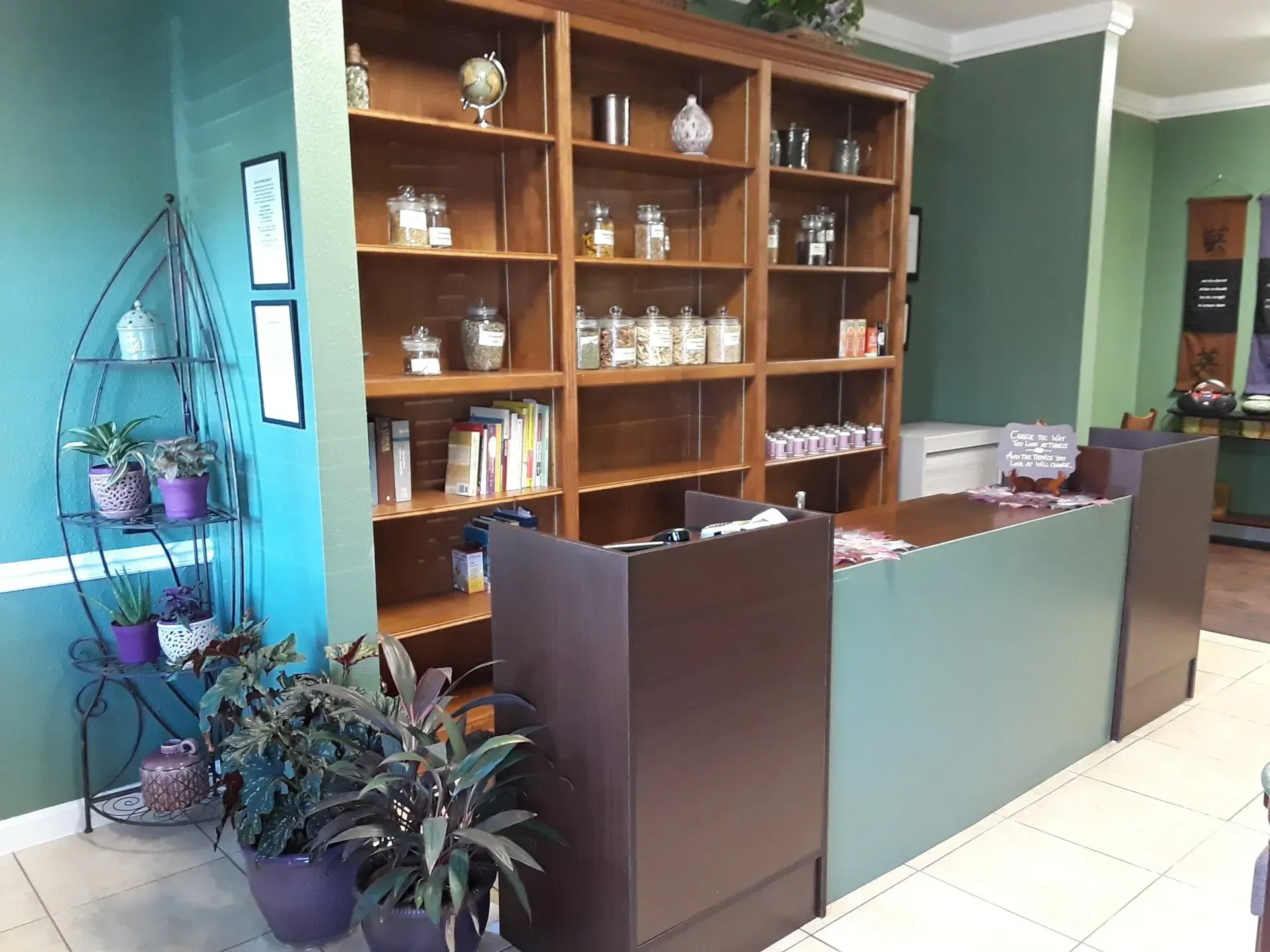A room with a lot of shelves and plants