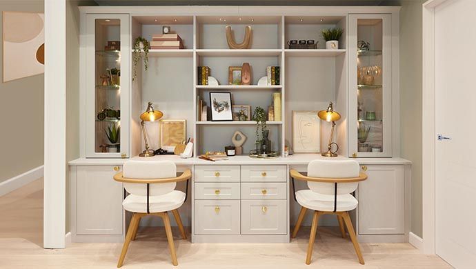 AD Construction NJ - Built-in home office with two desks, matching chairs, and display shelving. Neutral colors.