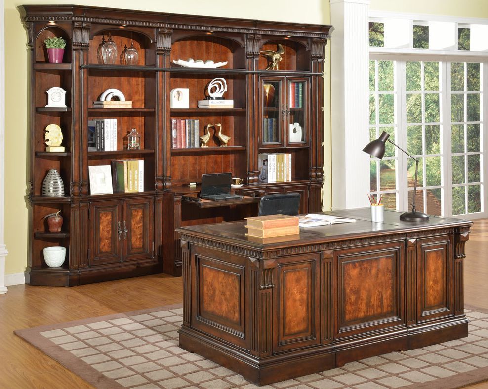 AD Construction NJ - Dark wood office furniture set with desk and bookcase in a room with a window.