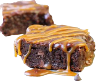 Slice of Basque cheesecake on a black plate, coffee, and water glass on a dark table.