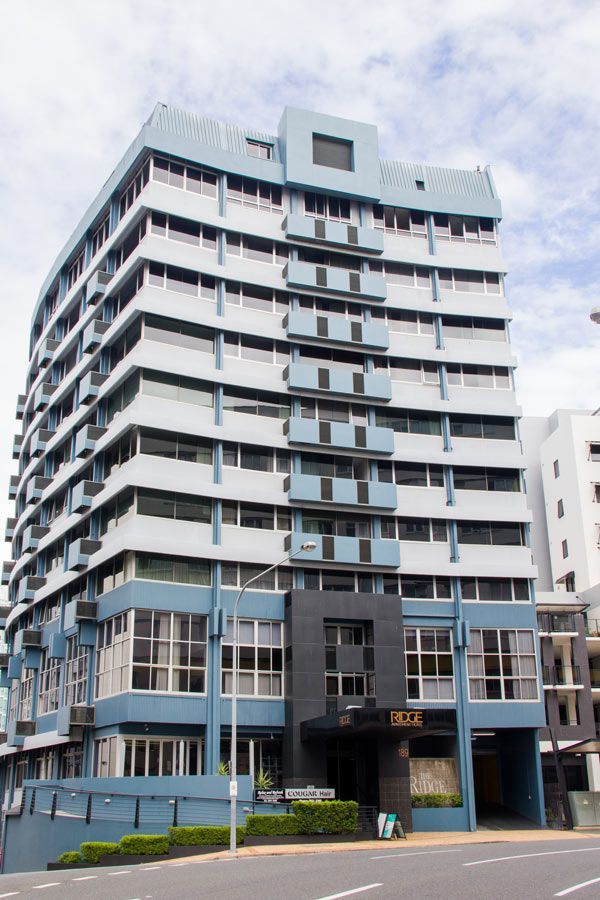 A Tall Building With A Lot Of Windows And Balconies — Datco Aluminium Pty Ltd In Grafton, NSW