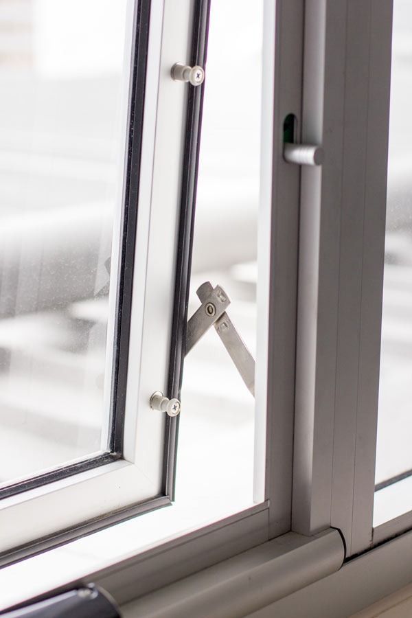 A Close Up Of A Window With A Lock On It — Datco Aluminium Pty Ltd In Murwillumbah, NSW