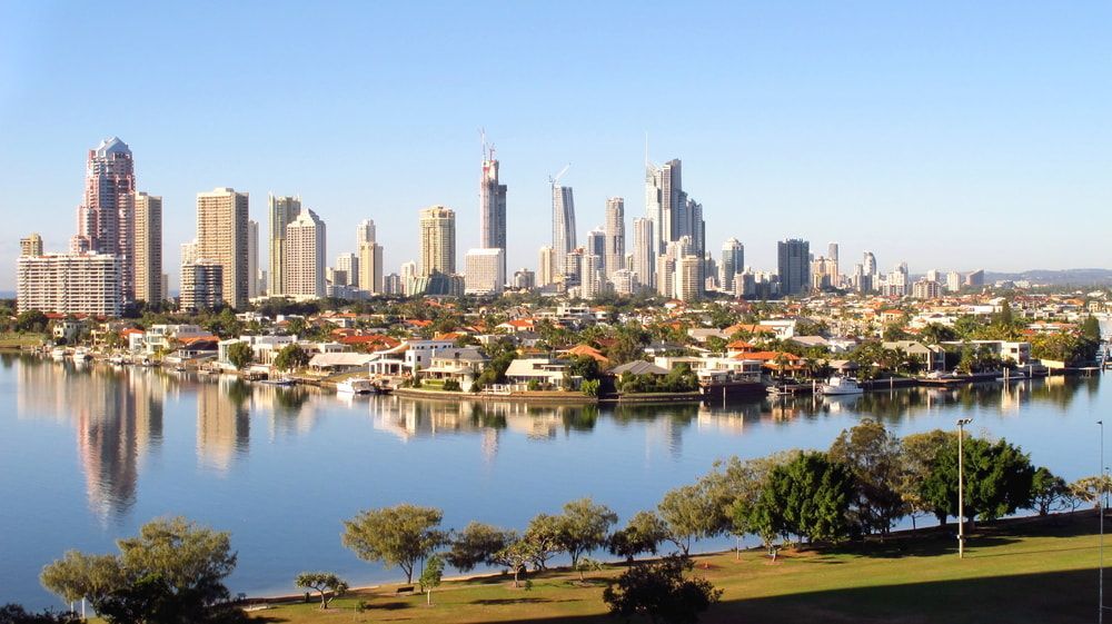 A City Skyline With A Lake In The Foreground — Datco Aluminium Pty Ltd In Gold Coast, City