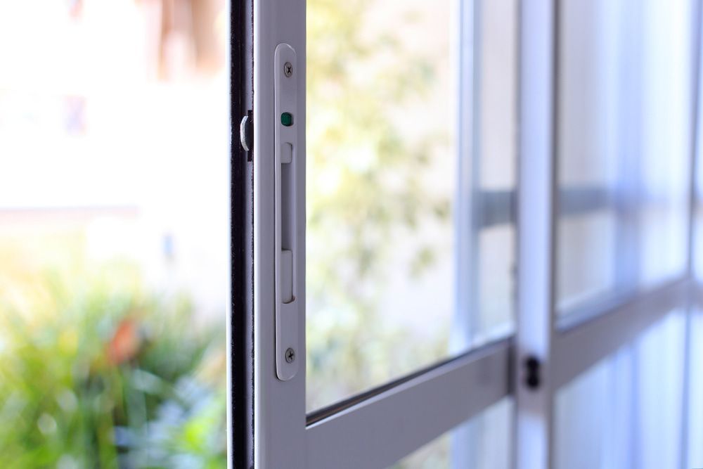 A Close Up Of An Open Sliding Glass Door — Datco Aluminium Pty Ltd In Murwillumbah, NSW