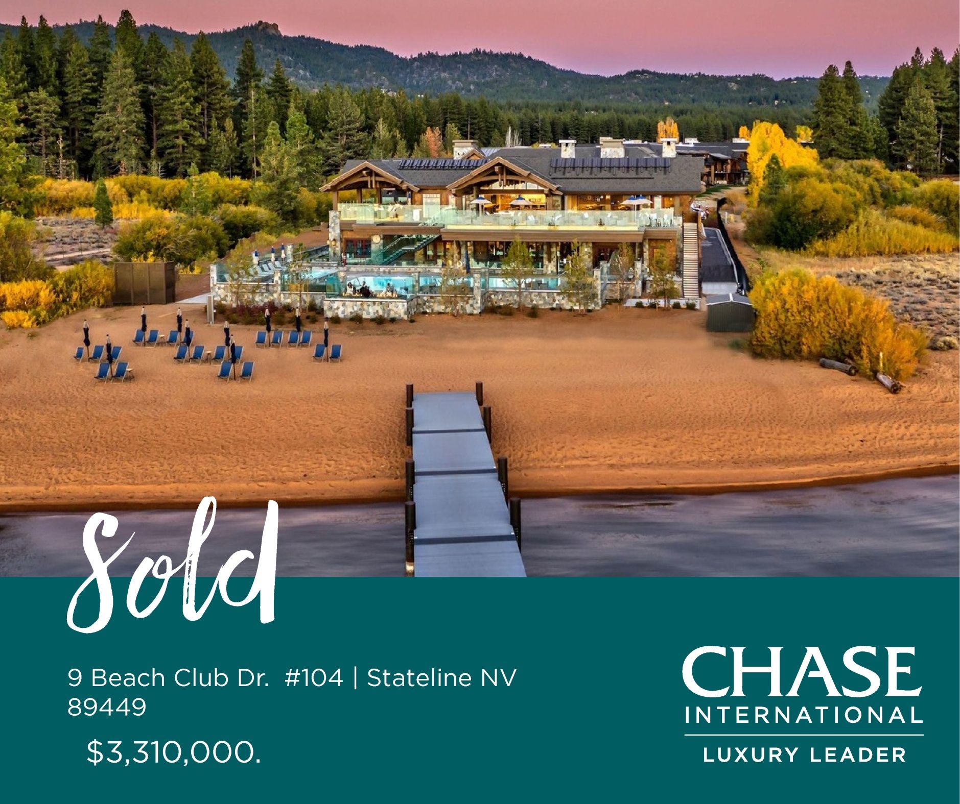 A patio with a lot of furniture and lights at night.