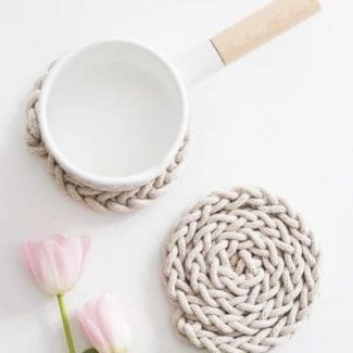 A Pot With a Wooden Handle and a Knitted Coaster Next to It — Groveland, FL — Never Look Back Project