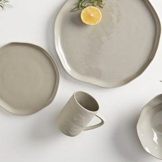 Table Topped With Plates and Mug — Groveland, FL — Never Look Back Project