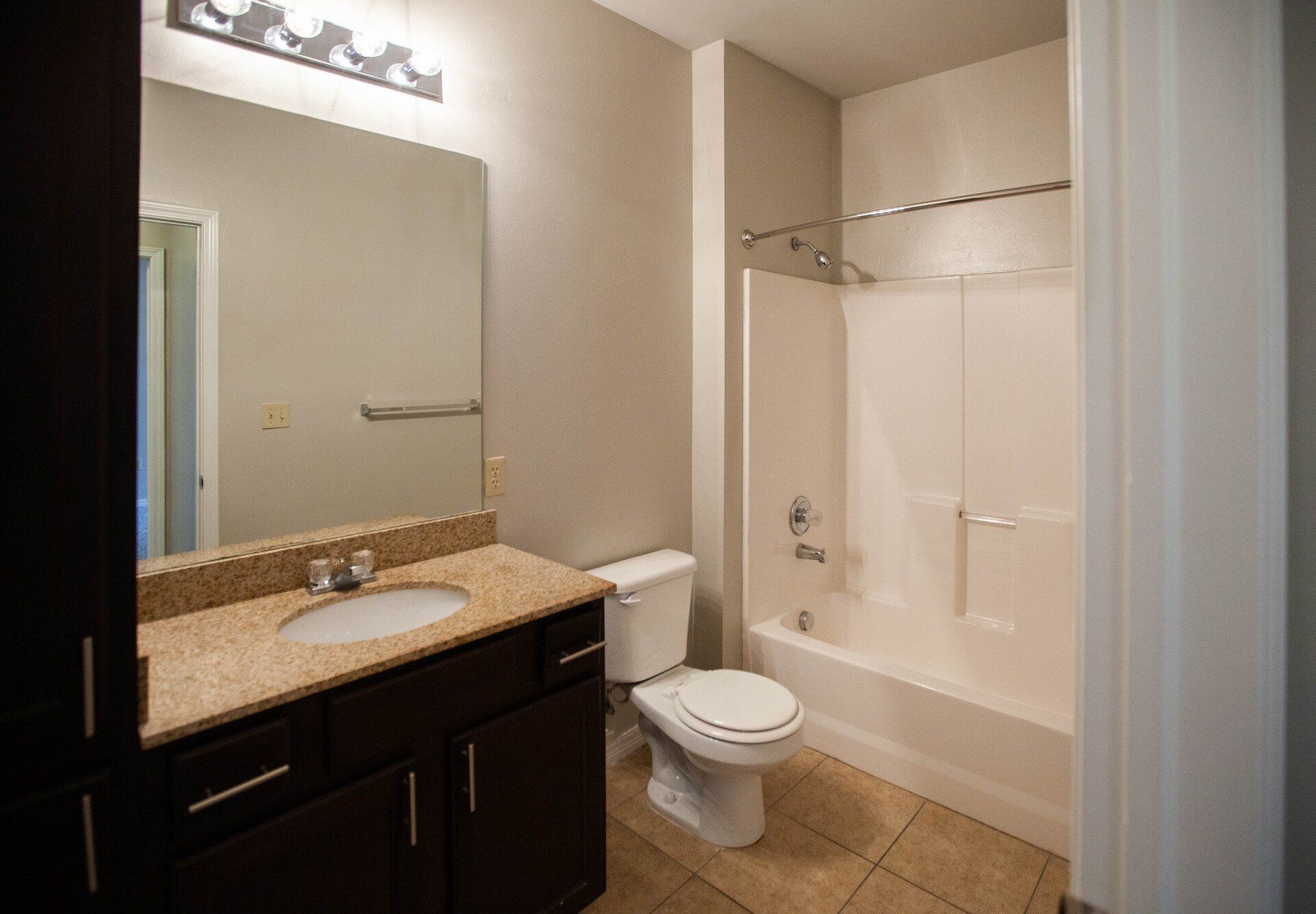 marquis on memorial bathroom sink toilet and shower