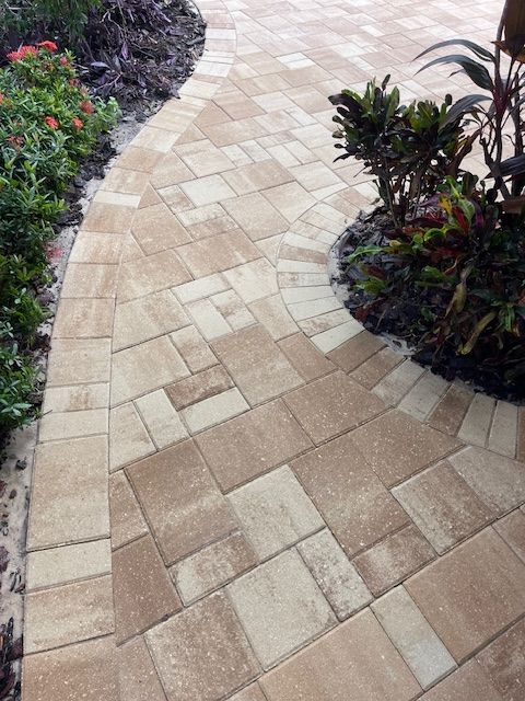 There is a cream/beige walkway.