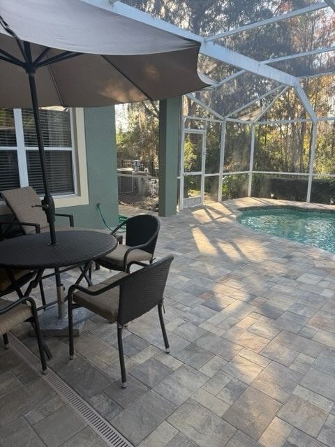 Flagstone's Heritage Cream/Beige/Charcoal Pavers with Coordinating Cream/Beige/Charcoal pool deck