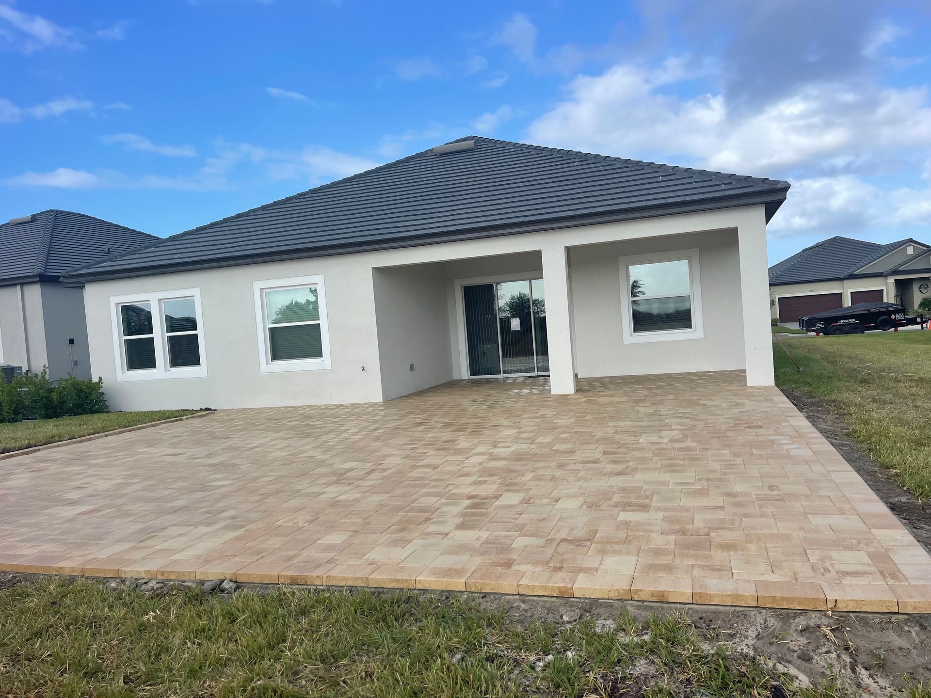 Flagstone's Independence Paver in Cream/Beige Laid in a Herringbone Pattern on a Patio