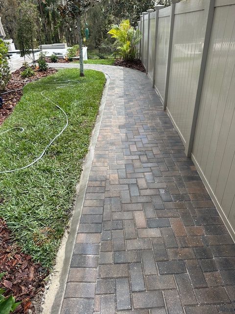 Tremron's 4x8 Pavers in Driftwood installed in a Herringbone pattern for a walkway