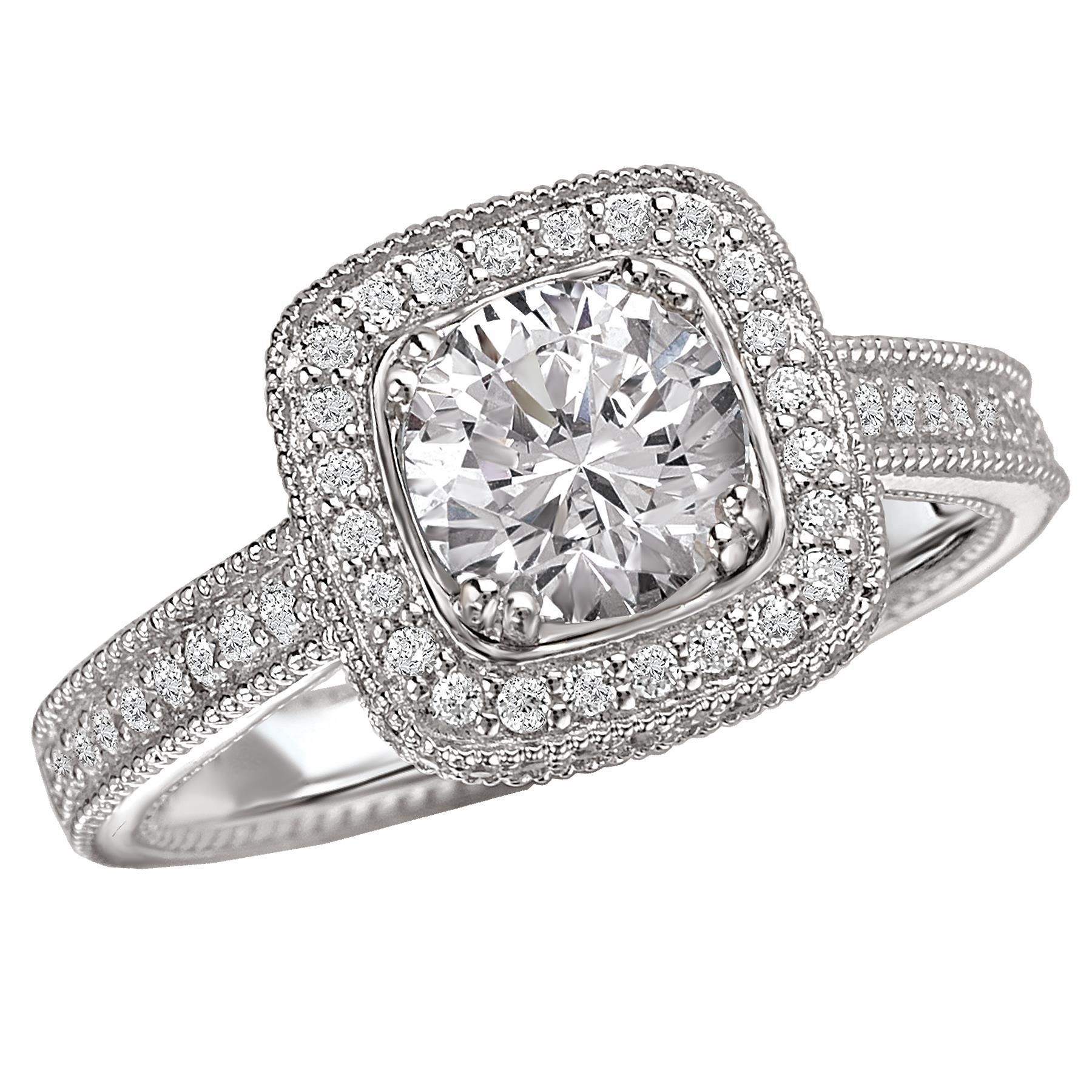 Round diamond halo engagement ring with pavé band on white background
