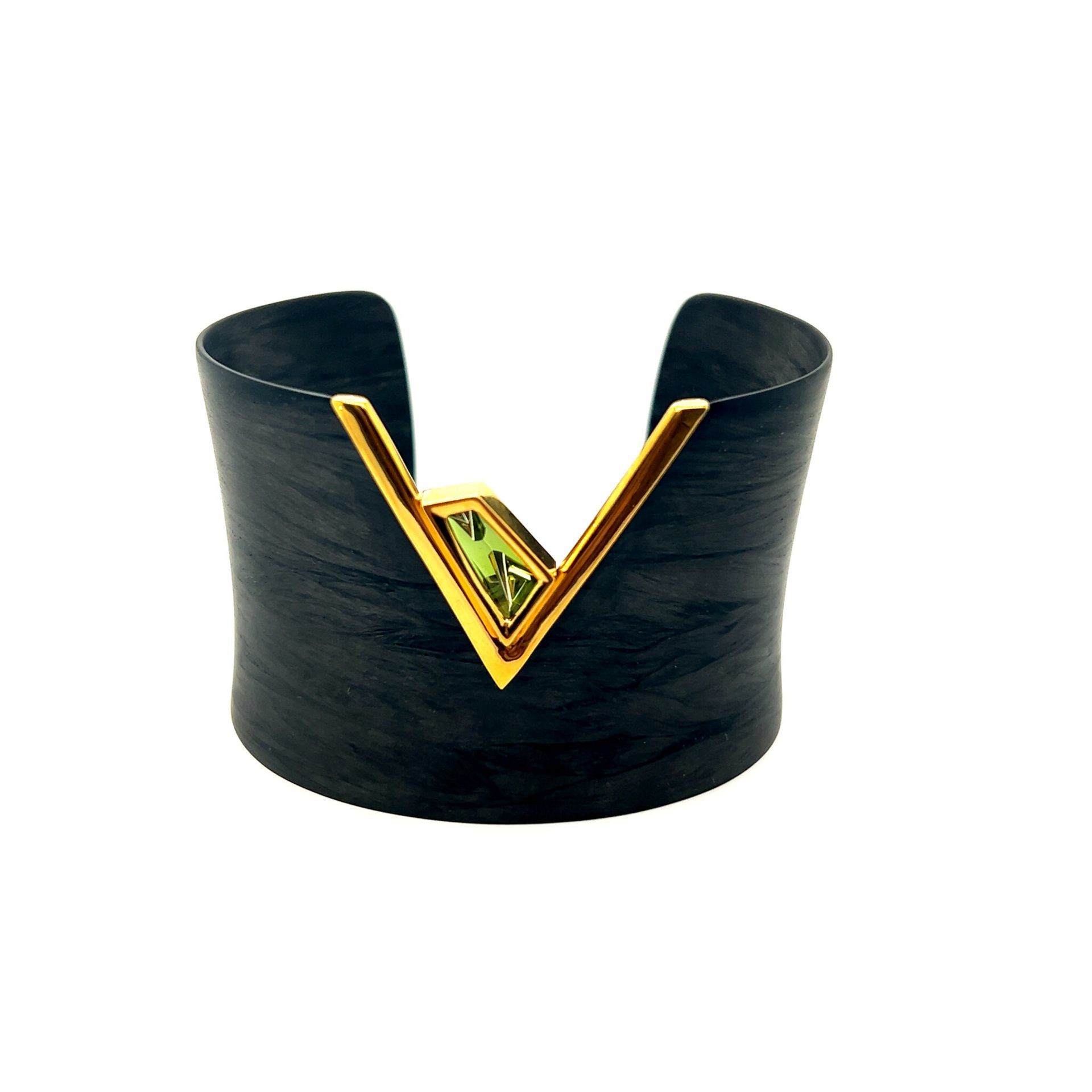 Black V-neck sleeveless top with gold trim and a small green emblem.