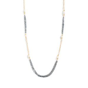 Delicate silver and gold beaded necklace on a white background