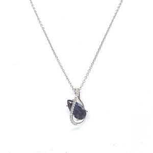 Silver necklace with a teardrop-shaped blue pendant on a white background