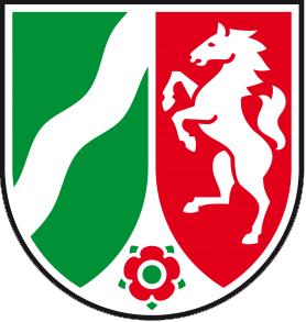 Ein grün-rotes Schild mit einem weißen Pferd auf den Hinterbeinen