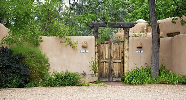 A wooden gate of a southwestern home.