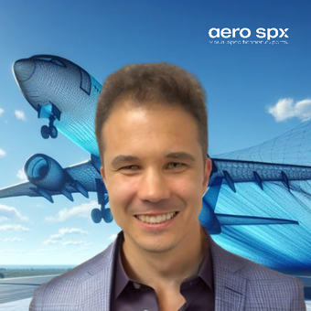 A man is smiling in front of an aero spx logo