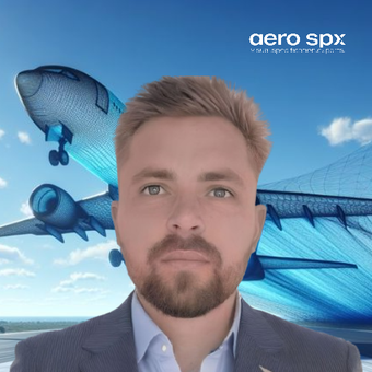 A man with a beard is standing in front of an aero spx logo