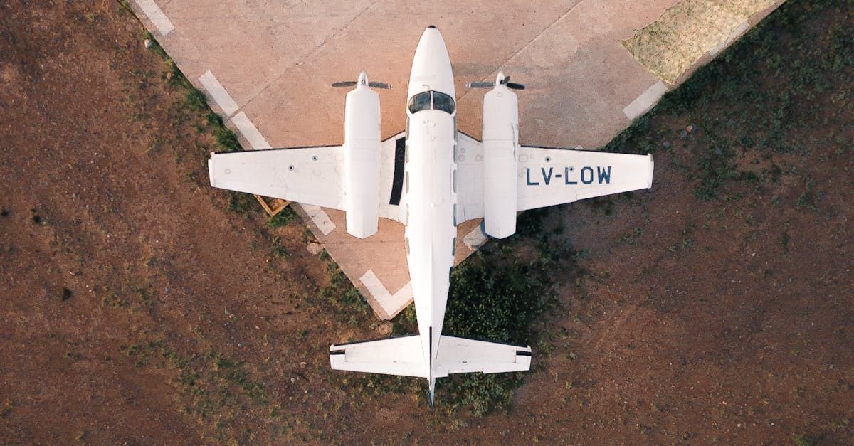 An aerial view of a small plane with the letters lv-com on the tail