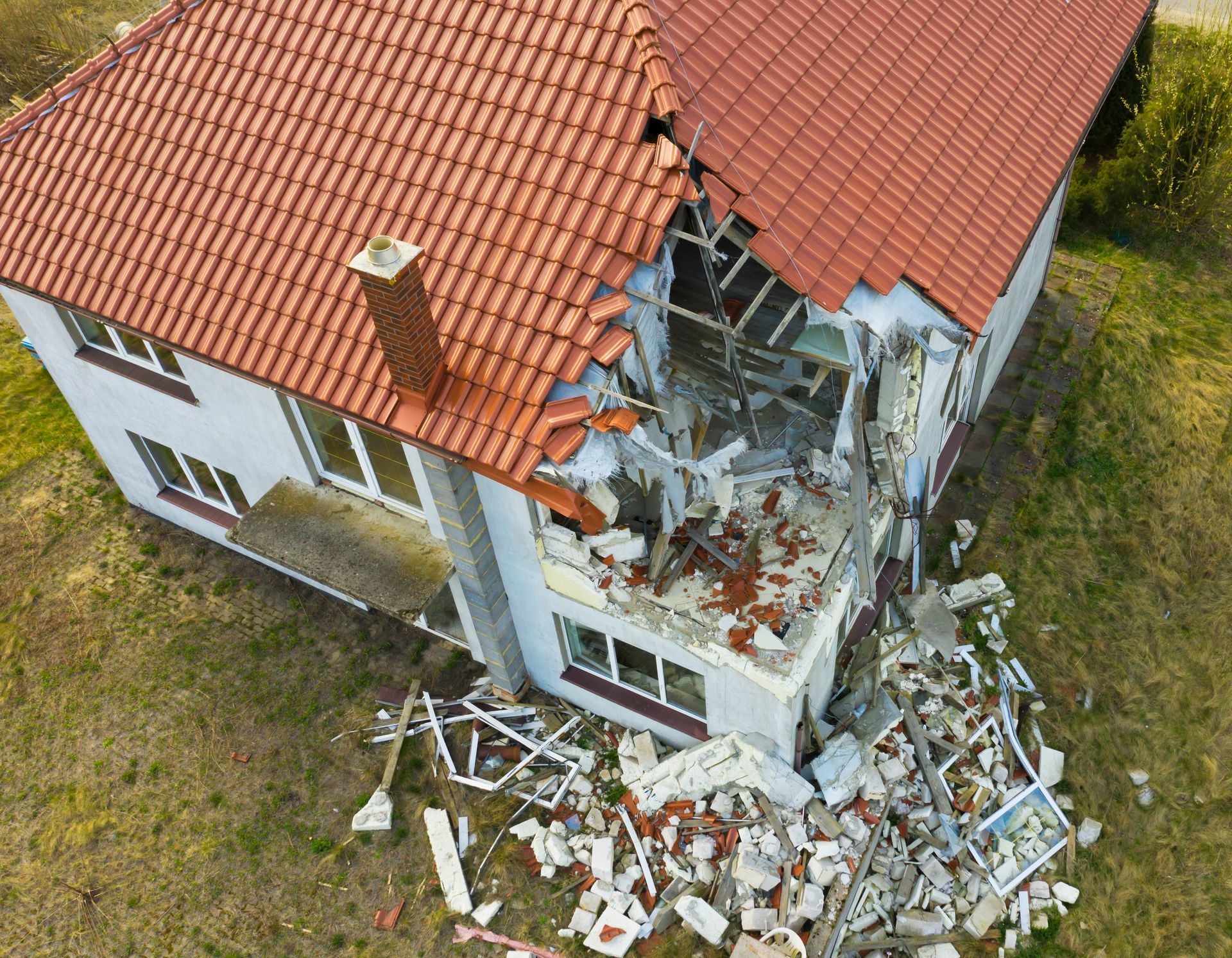 an aerial view of a house that has been demolished .