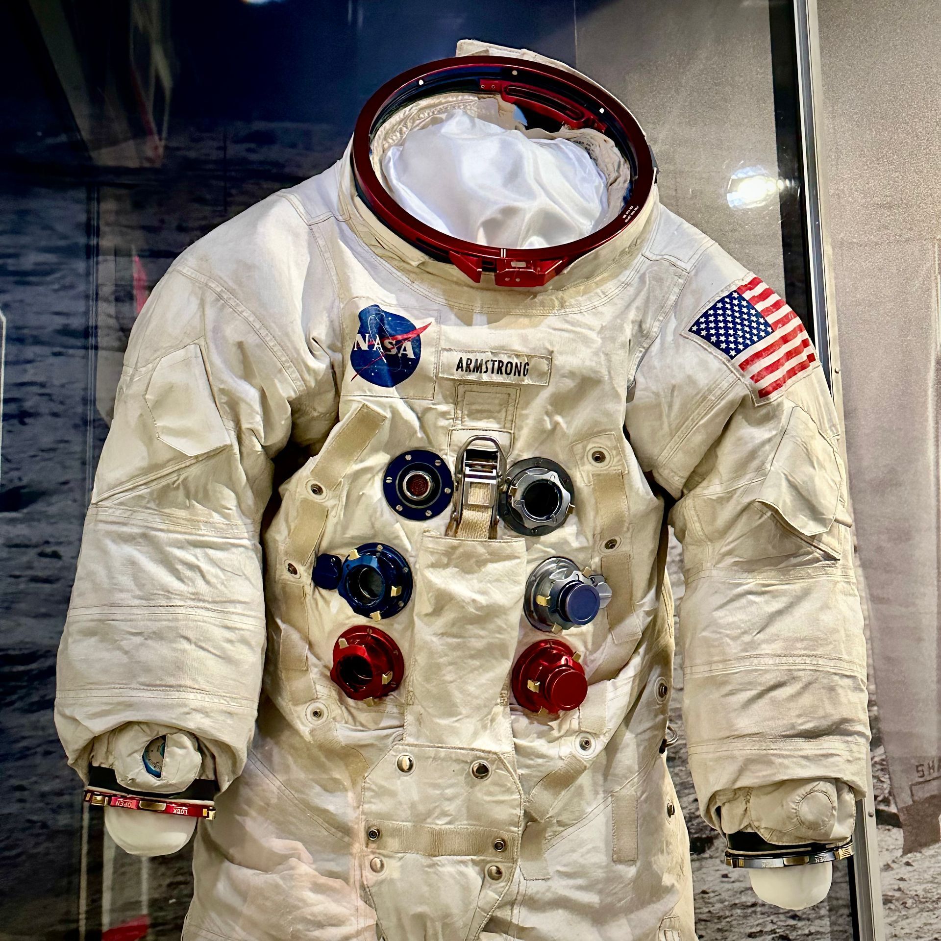 An astronaut 's space suit is on display in a museum.
