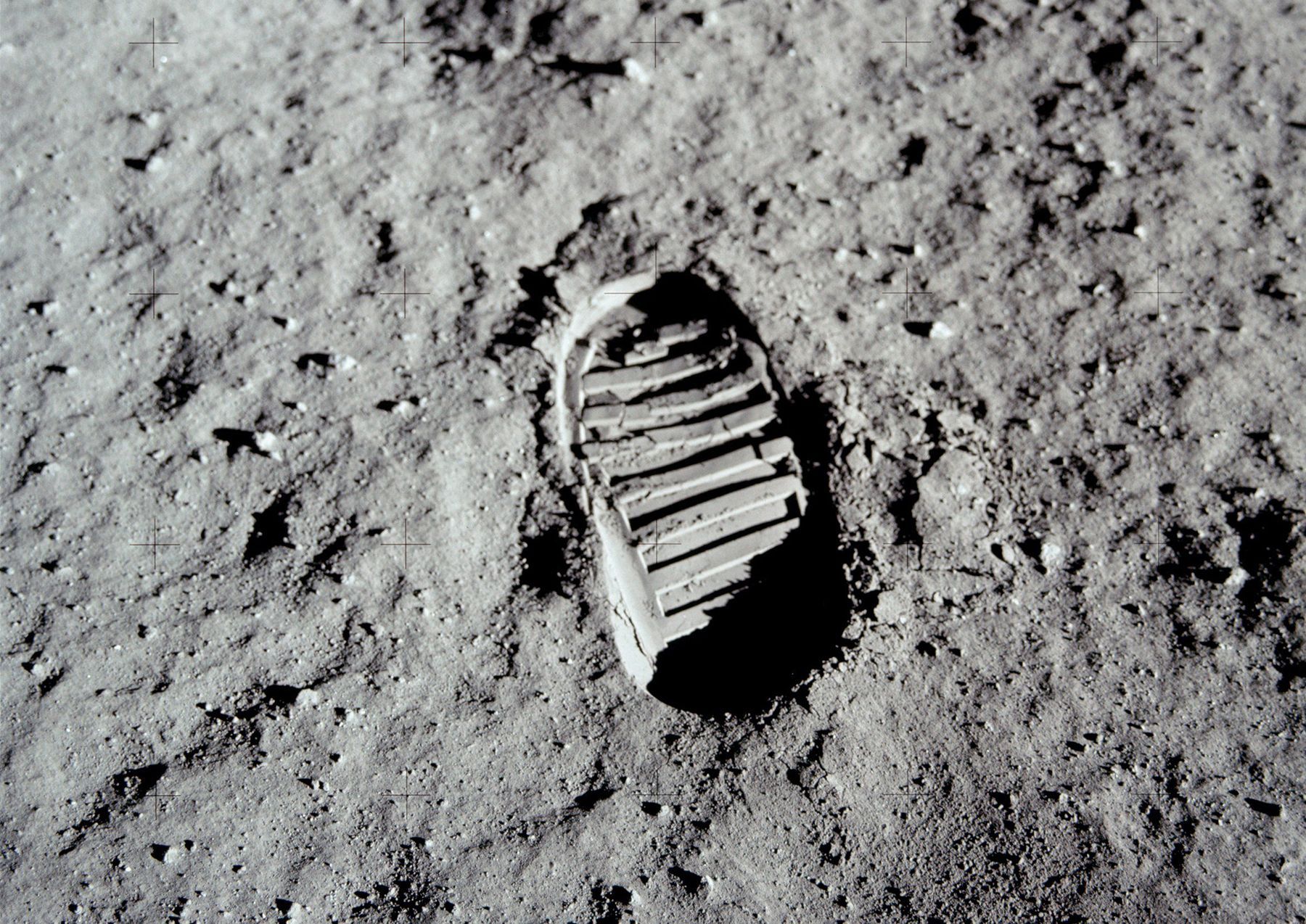 A black and white photo of Neil Armstrong's bootprint on the lunar surface.
