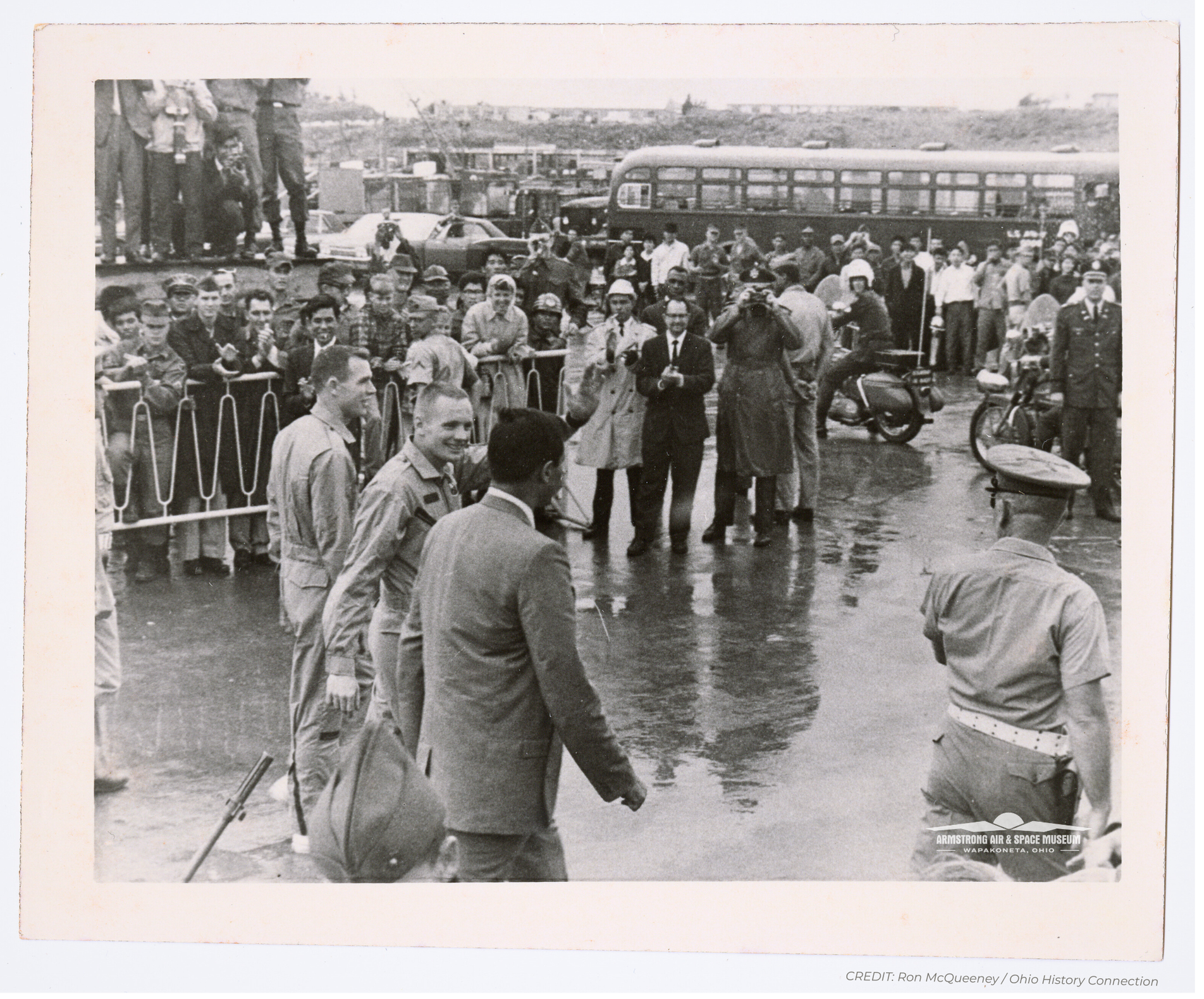 Neil Armstrong waving to a crowd at Naha Air Base, March 1966.