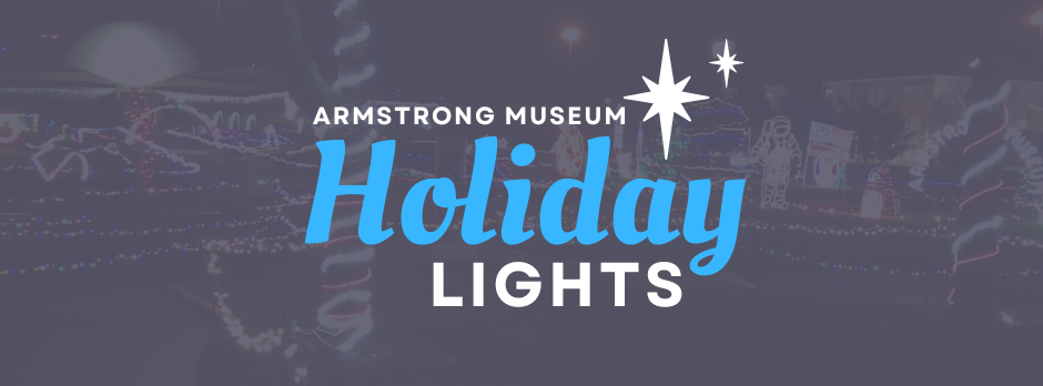 The logo for the Armstrong Museum Holiday Lights is blue and white.