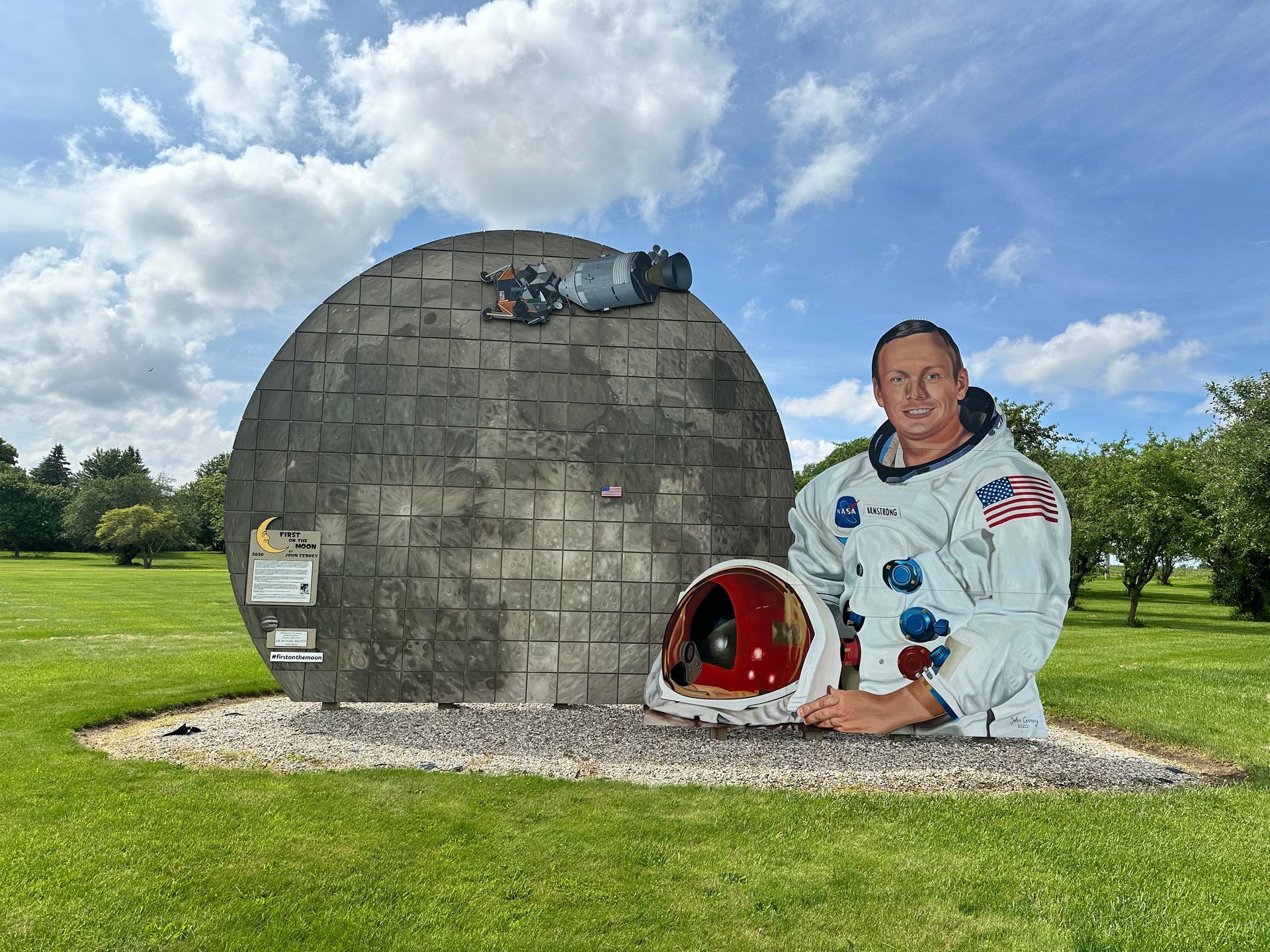 A mural of Neil Armstrong with the Moon in the background.
