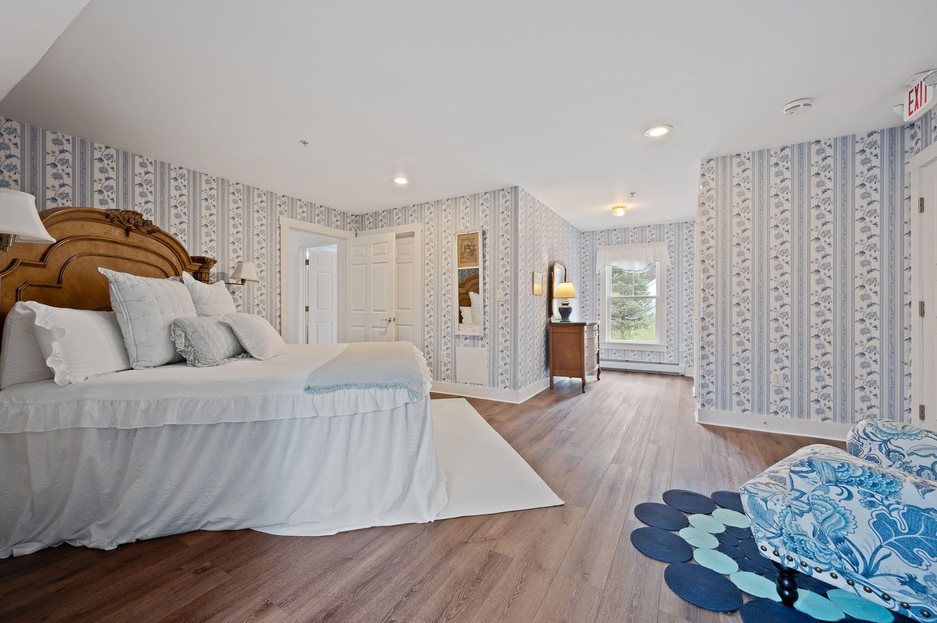 There is a large bed in the middle of the room.