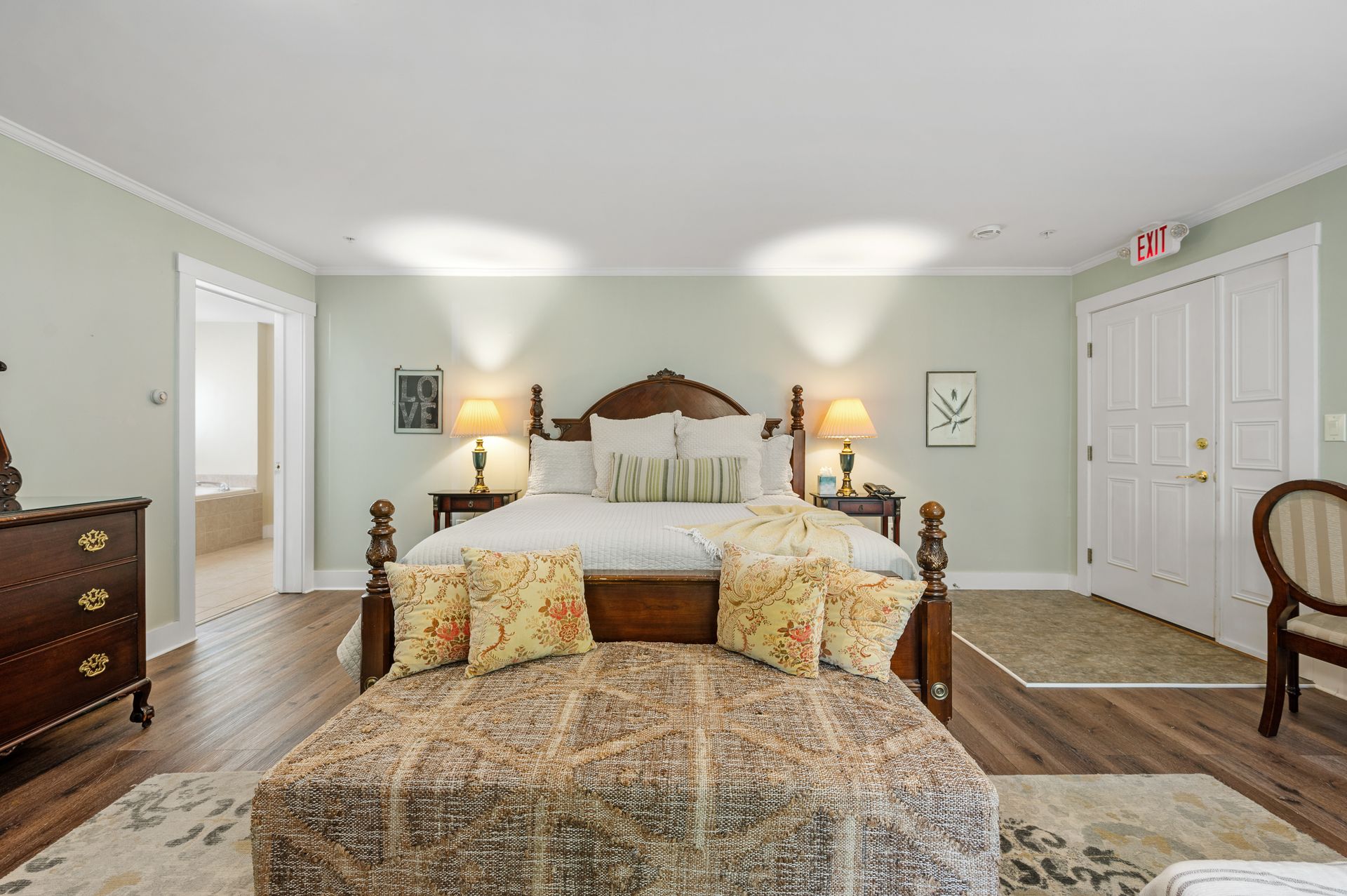 There is a large bed in the middle of the room.