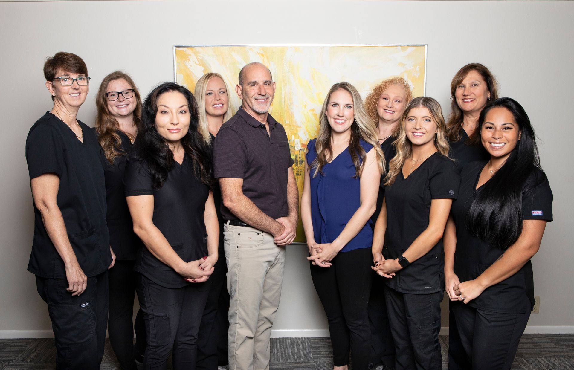 A group of people are posing for a picture together.