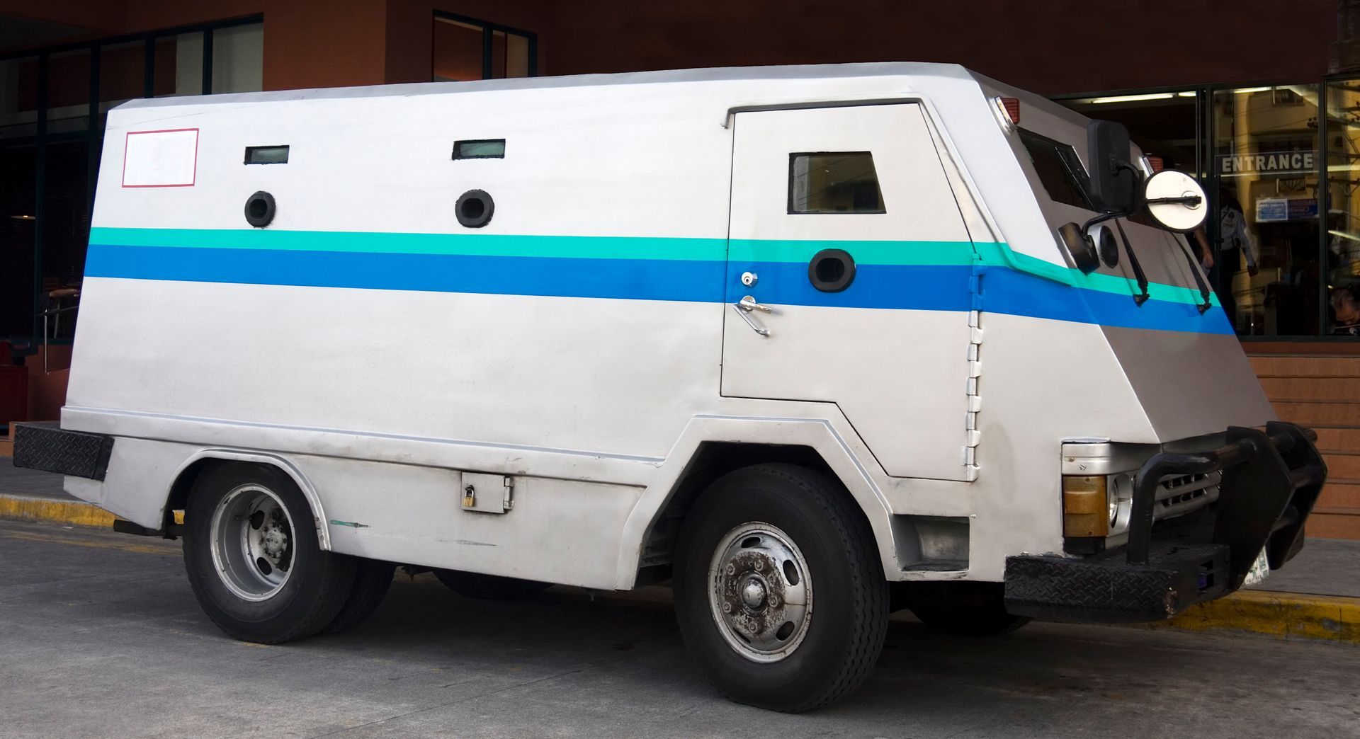 Armored Truck With Blue Stripes — Denver, CO — DPS Armored