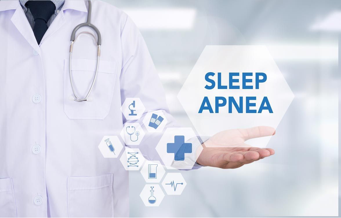 A doctor is holding a sign that says sleep apnea.