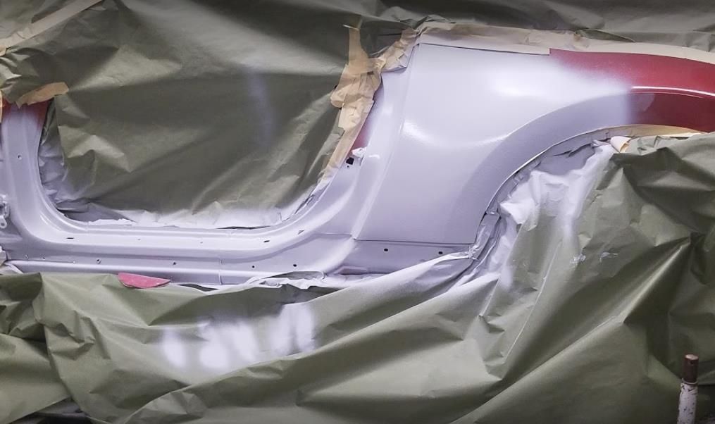 Recreational vehicle (RV) connected to an external electricity source with power cord plugged in.