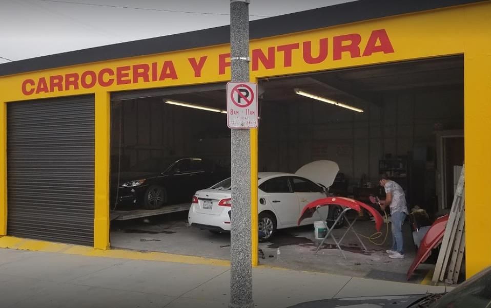Recreational vehicle (RV) connected to an external electricity source with power cord plugged in.