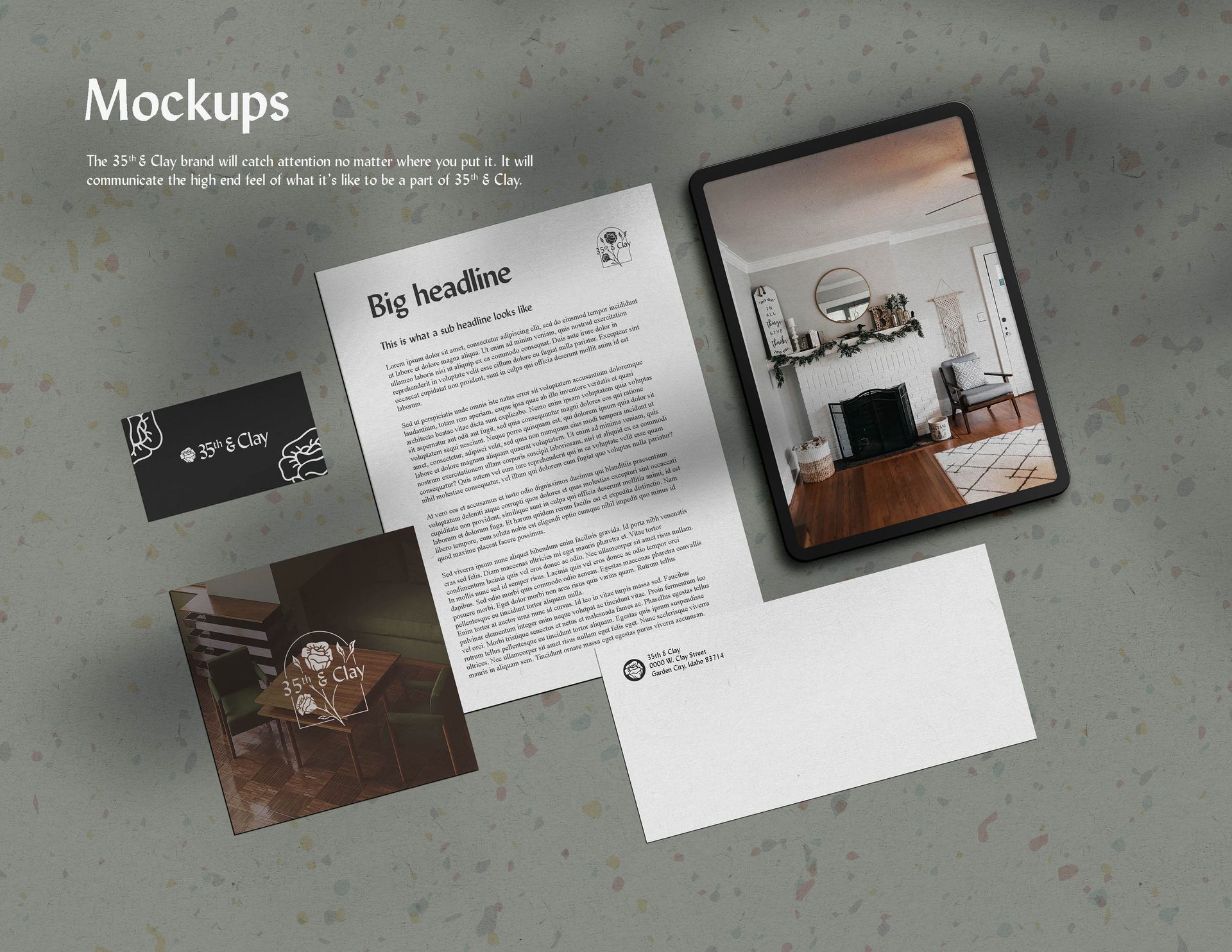 A mockup of a business card , letter , and tablet