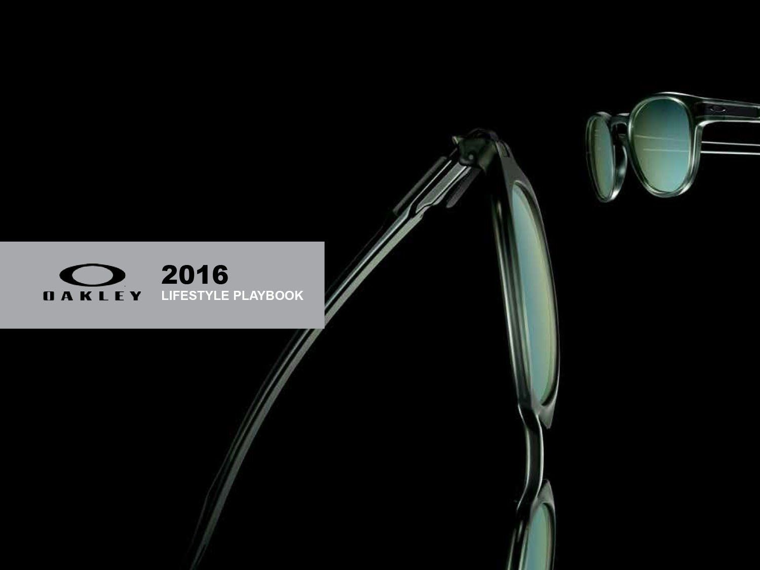 A pair of oakley sunglasses on a black background